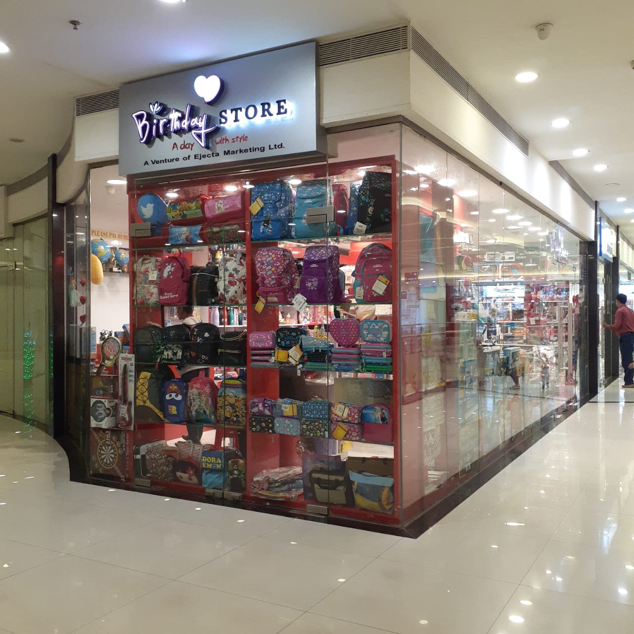 Building,Outlet store,Retail,Product,Shopping mall,Display case,Trade,Interior design,Display window