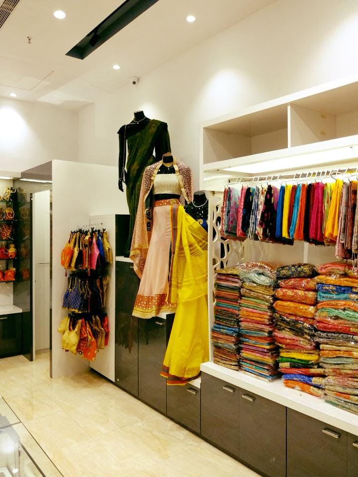 Boutique,Clothing,Outlet store,Room,Fashion,Building,Retail,Interior design,Outerwear,Textile