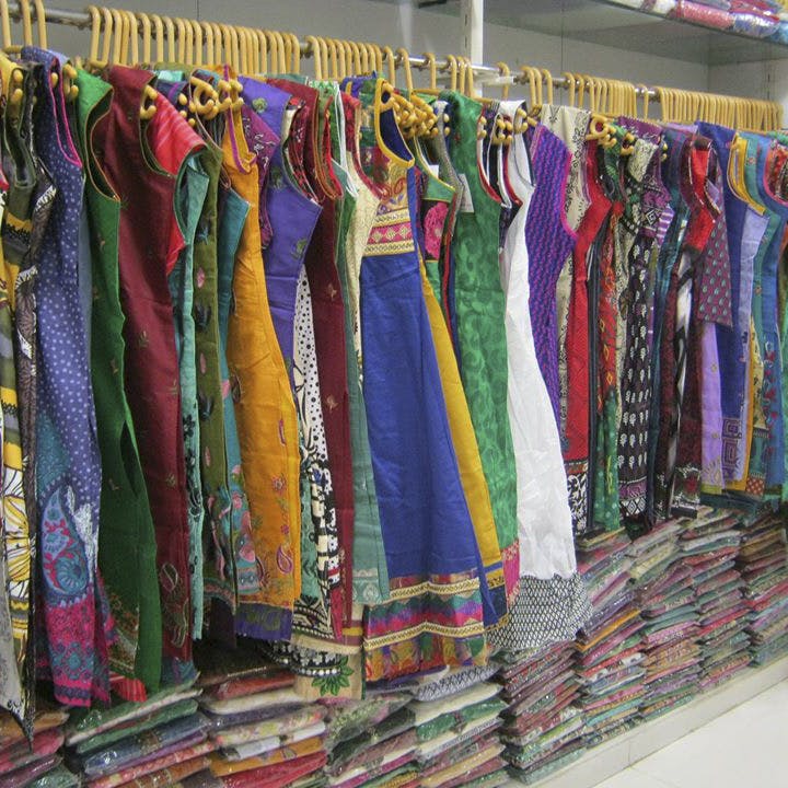 Clothing,Boutique,Clothes hanger,Textile,Room,Bazaar,Dress,Fashion design,Outlet store,Fashion accessory