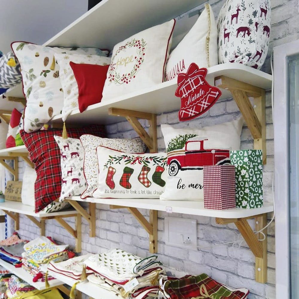 Room,Shelf,Christmas stocking,Textile,Furniture,Linens,Interior design,Pillow,Home,House