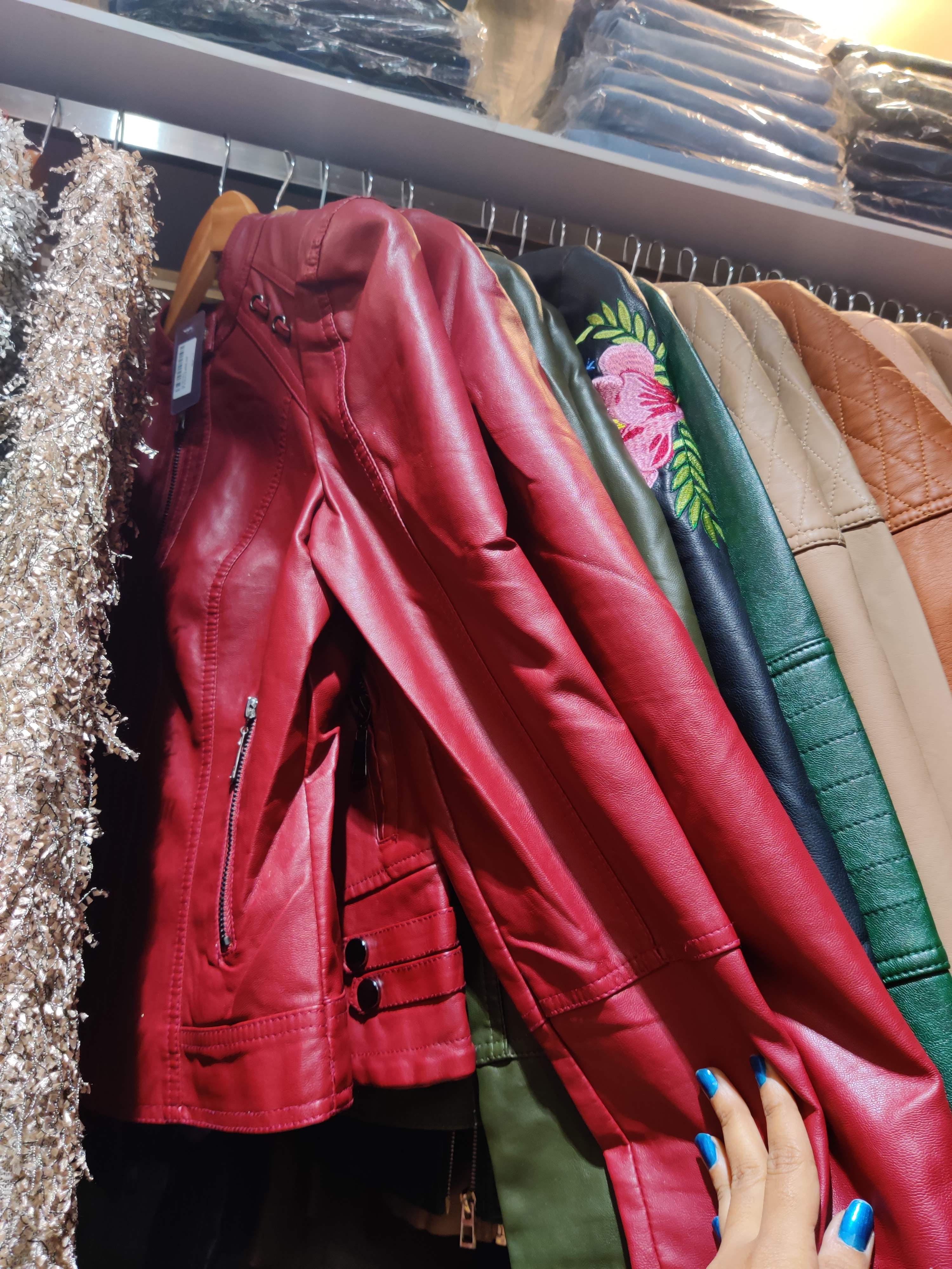 Leather,Clothing,Jacket,Leather jacket,Red,Pink,Textile,Outerwear,Magenta,Room