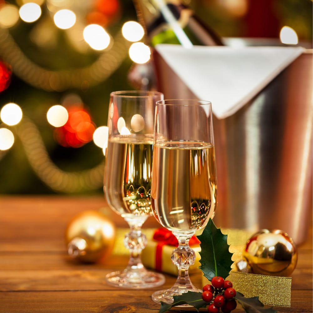 Drink,Stemware,Wine glass,Champagne stemware,Glass,Drinkware,Alcoholic beverage,Christmas eve,Christmas,Champagne