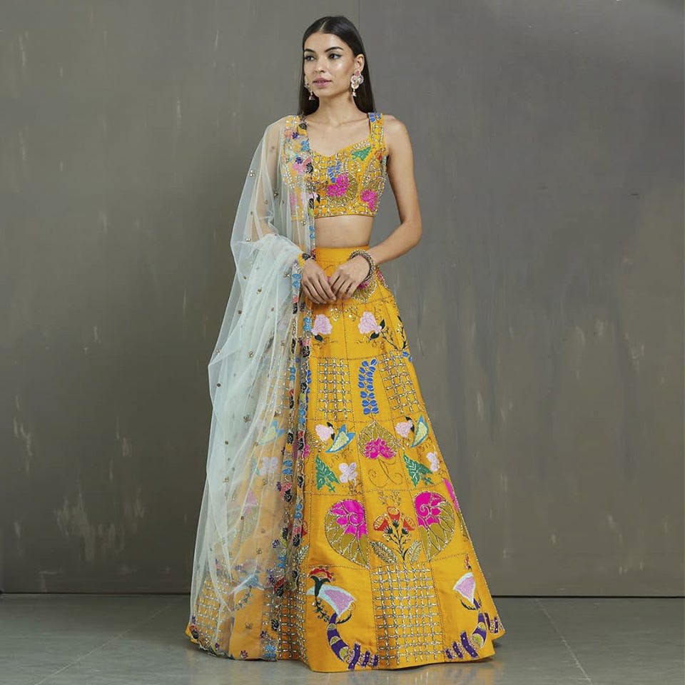 Clothing,Yellow,Dress,Fashion model,Formal wear,Fashion,Gown,Tradition,Shoulder,Embroidery