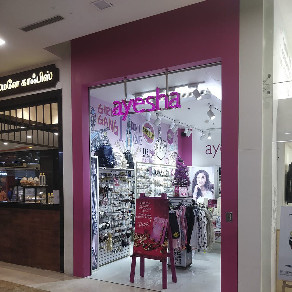 Boutique,Pink,Building,Product,Outlet store,Interior design,Retail,Display window,Display case,Magenta