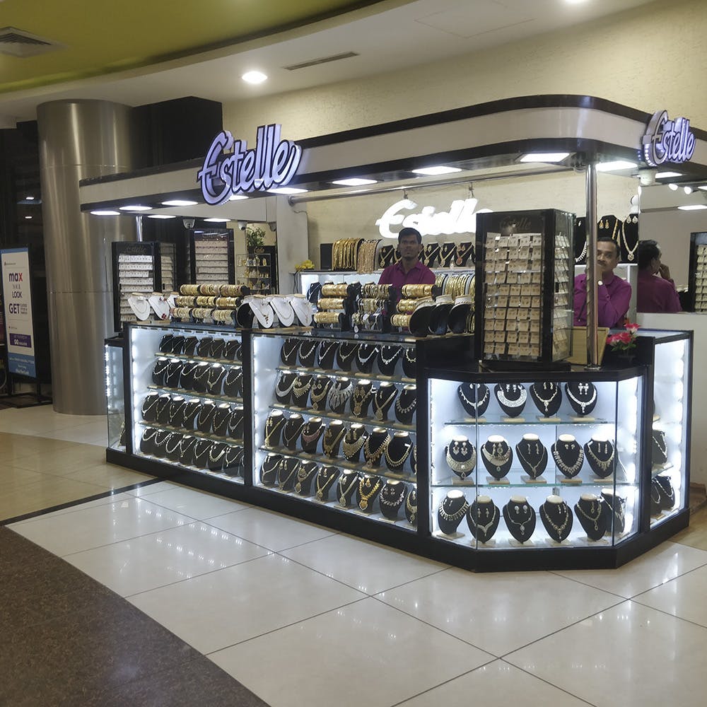 Product,Retail,Outlet store,Building,Display case,Footwear,Eyewear,Shopping mall,Shoe,Interior design