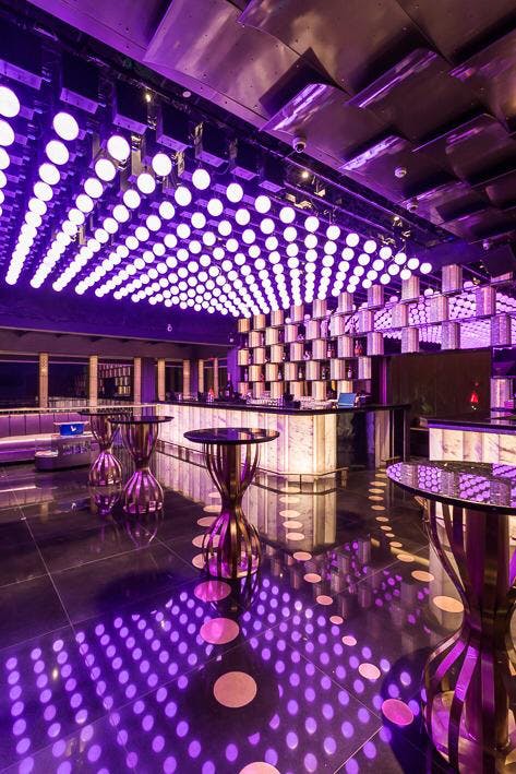 Purple,Violet,Lighting,Function hall,Nightclub,Design,Interior design,Building,Disco,Music