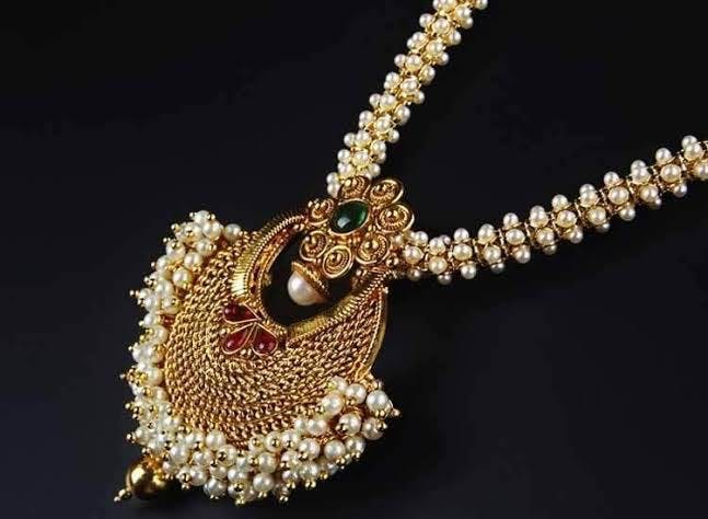 Jewellery,Fashion accessory,Necklace,Gold,Pendant,Body jewelry,Chain,Pearl,Gemstone,Diamond