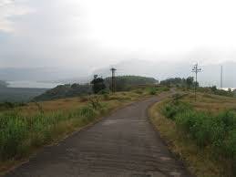 Road,Atmospheric phenomenon,Highland,Hill station,Land lot,Thoroughfare,Hill,Rural area,Trail,Asphalt