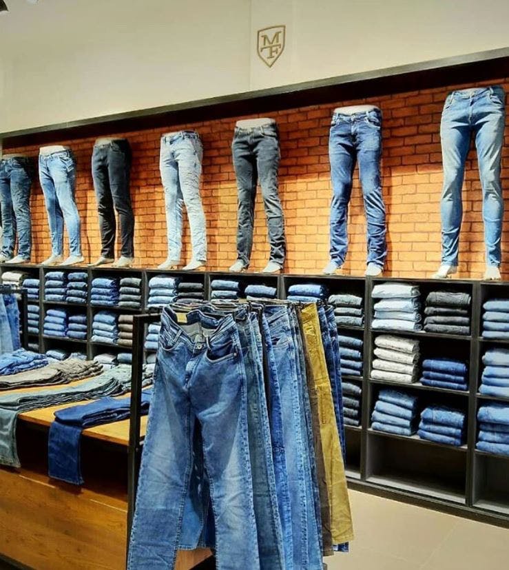 Jeans,Denim,Room,Textile,Footwear,Boutique,Shoe,Trousers,Clothes hanger,Closet