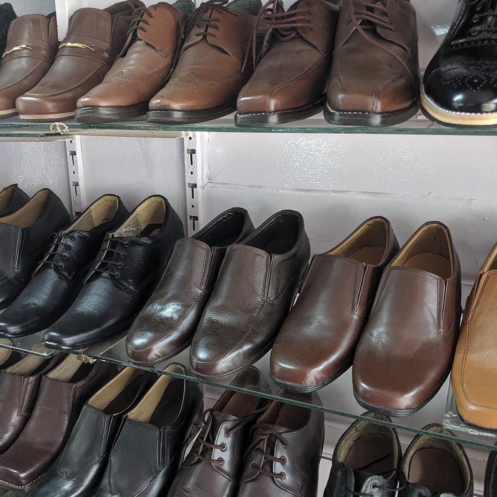 Footwear,Shoe,Brown,Shoe store,Cordwainer,Leather,Boot,Shoemaking