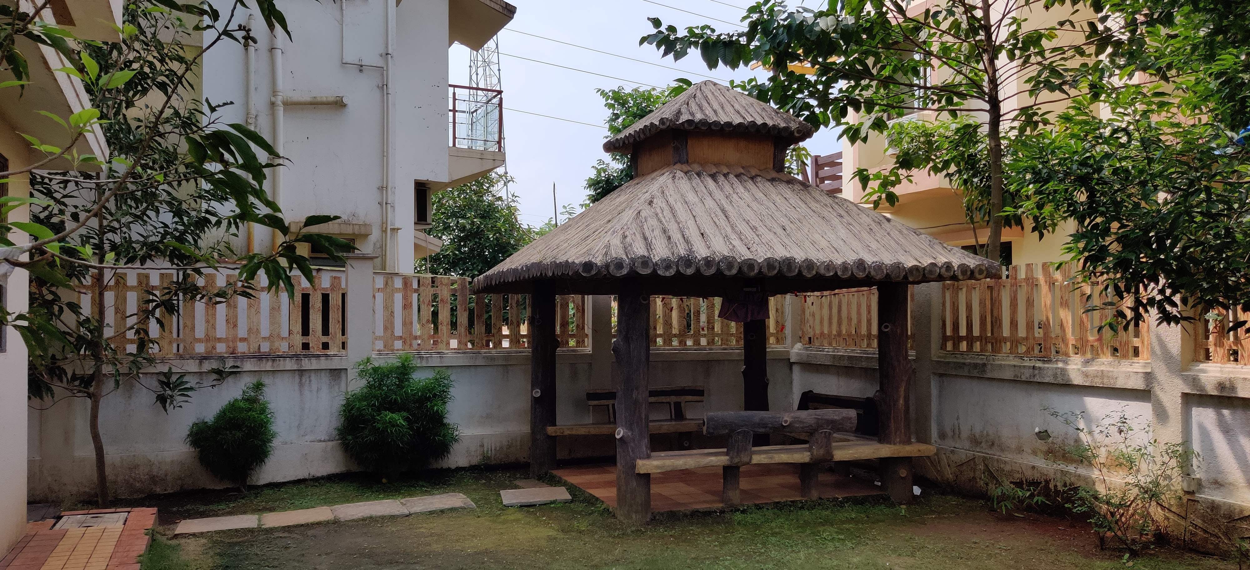 Gazebo,Property,Building,Roof,Pavilion,Outdoor structure,House,Courtyard,Shade,Hacienda