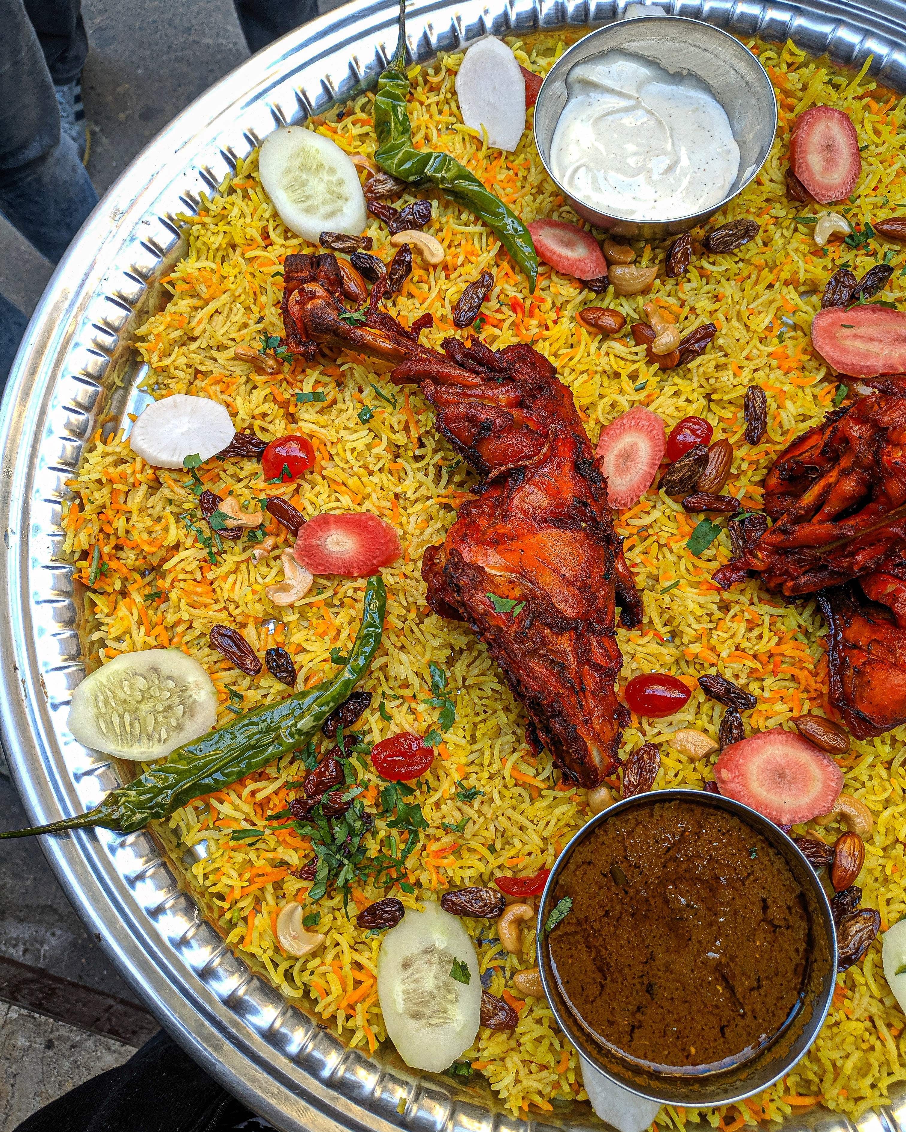 Dish,Cuisine,Food,Biryani,Kabsa,Ingredient,Mandi,Indian cuisine,Maqluba,Rice
