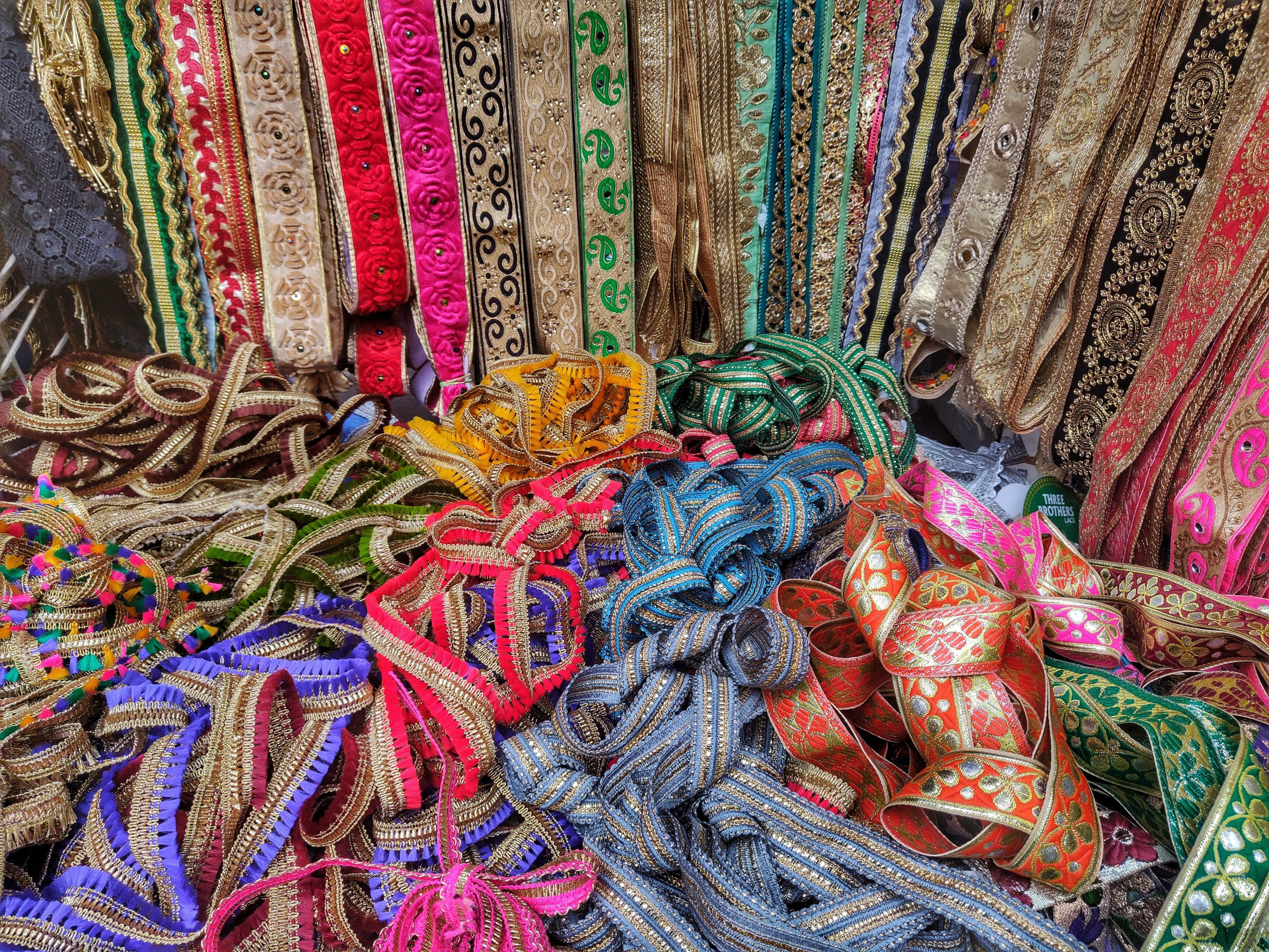 Woolen,Wool,Textile,Public space,Thread,Woven fabric,Market,Bazaar,Silk,Stole