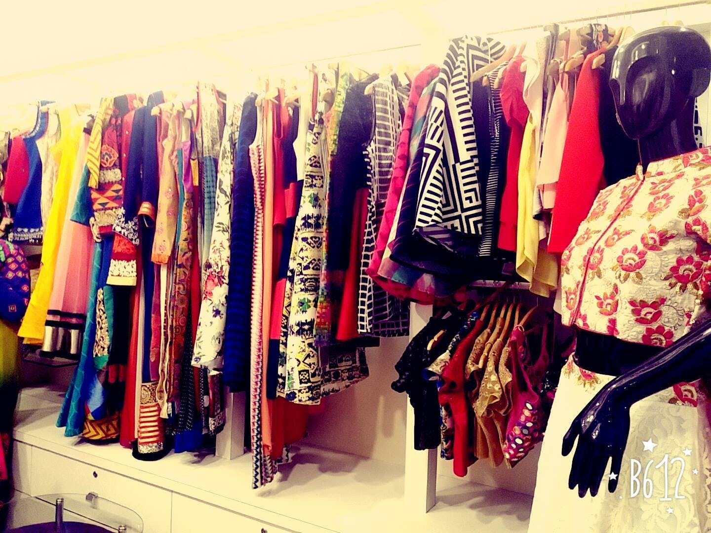 Boutique,Clothing,Closet,Room,Fashion,Fashion design,Wardrobe,Textile,Clothes hanger,Dress