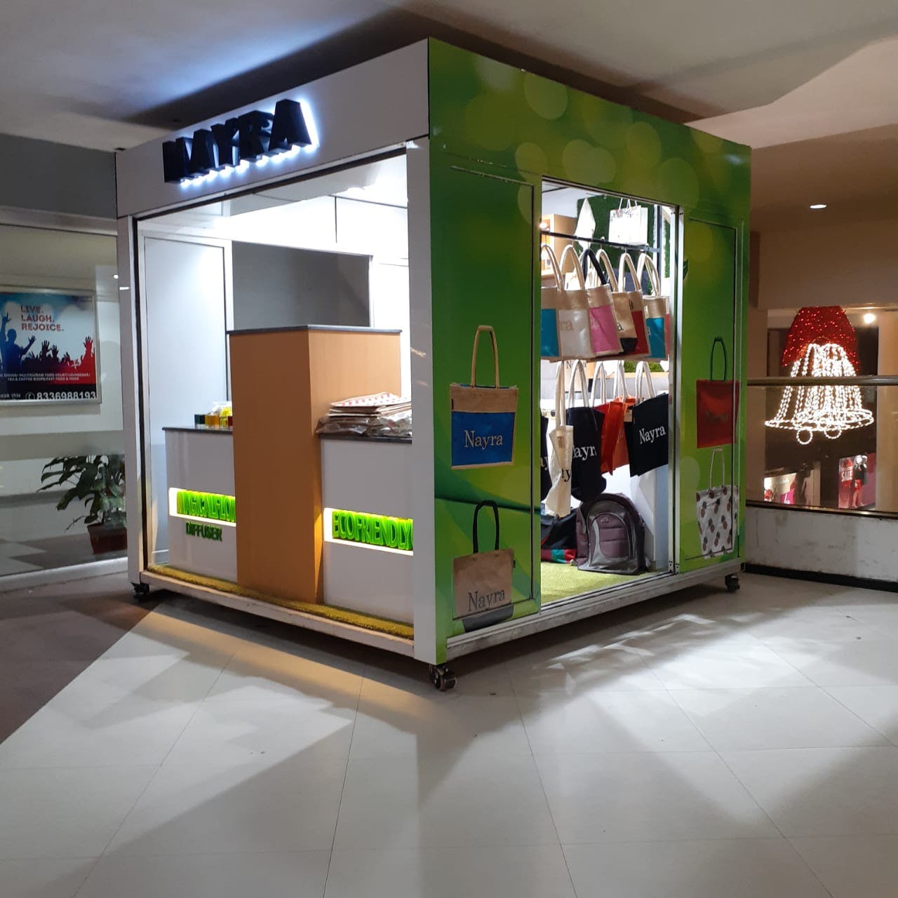 Building,Product,Interior design,Retail,Display case,Room,Outlet store,Kiosk,Shopping mall,Furniture