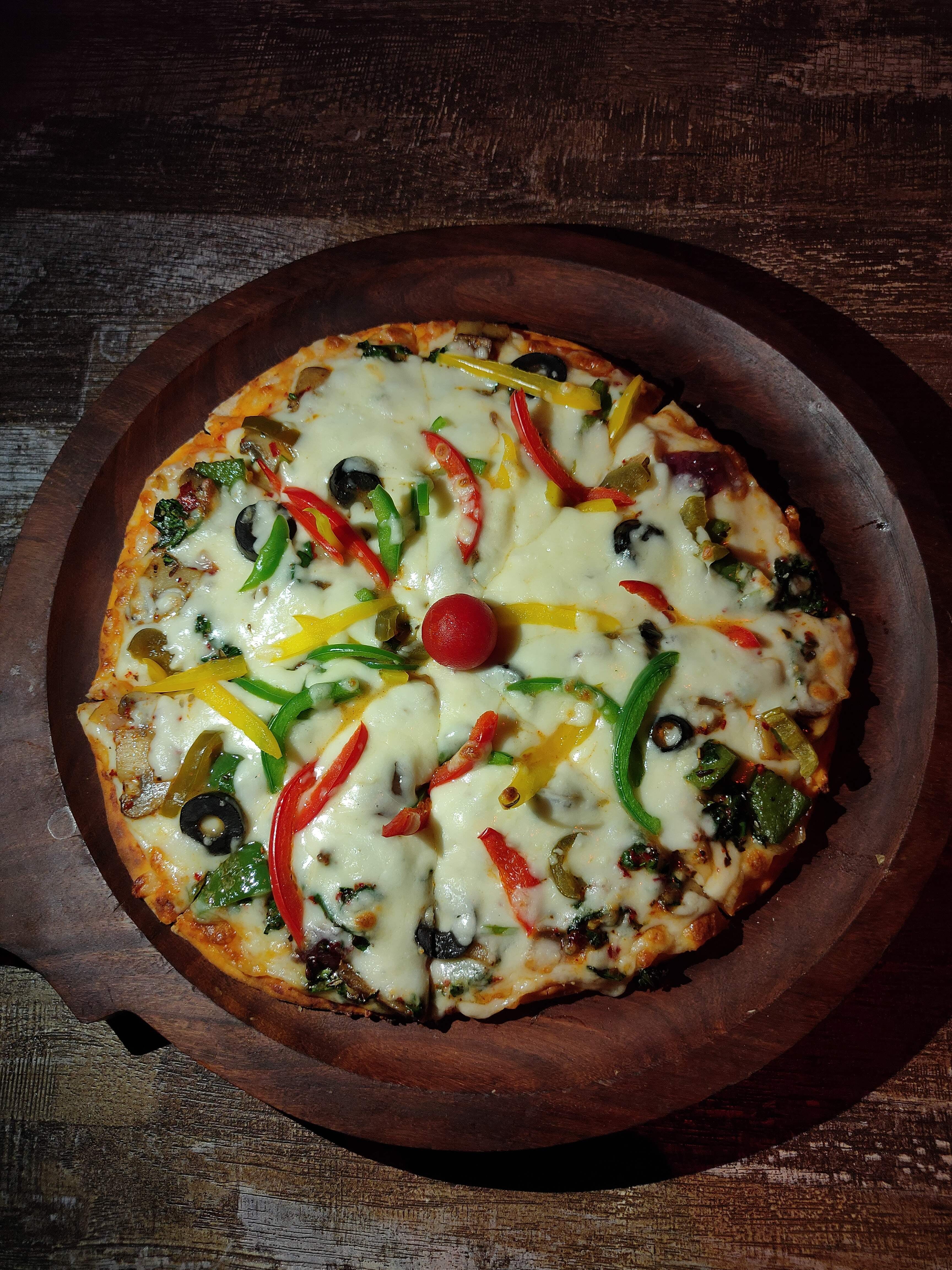 Dish,Food,Cuisine,Pizza cheese,Pizza,Ingredient,Flatbread,California-style pizza,Comfort food,Quiche