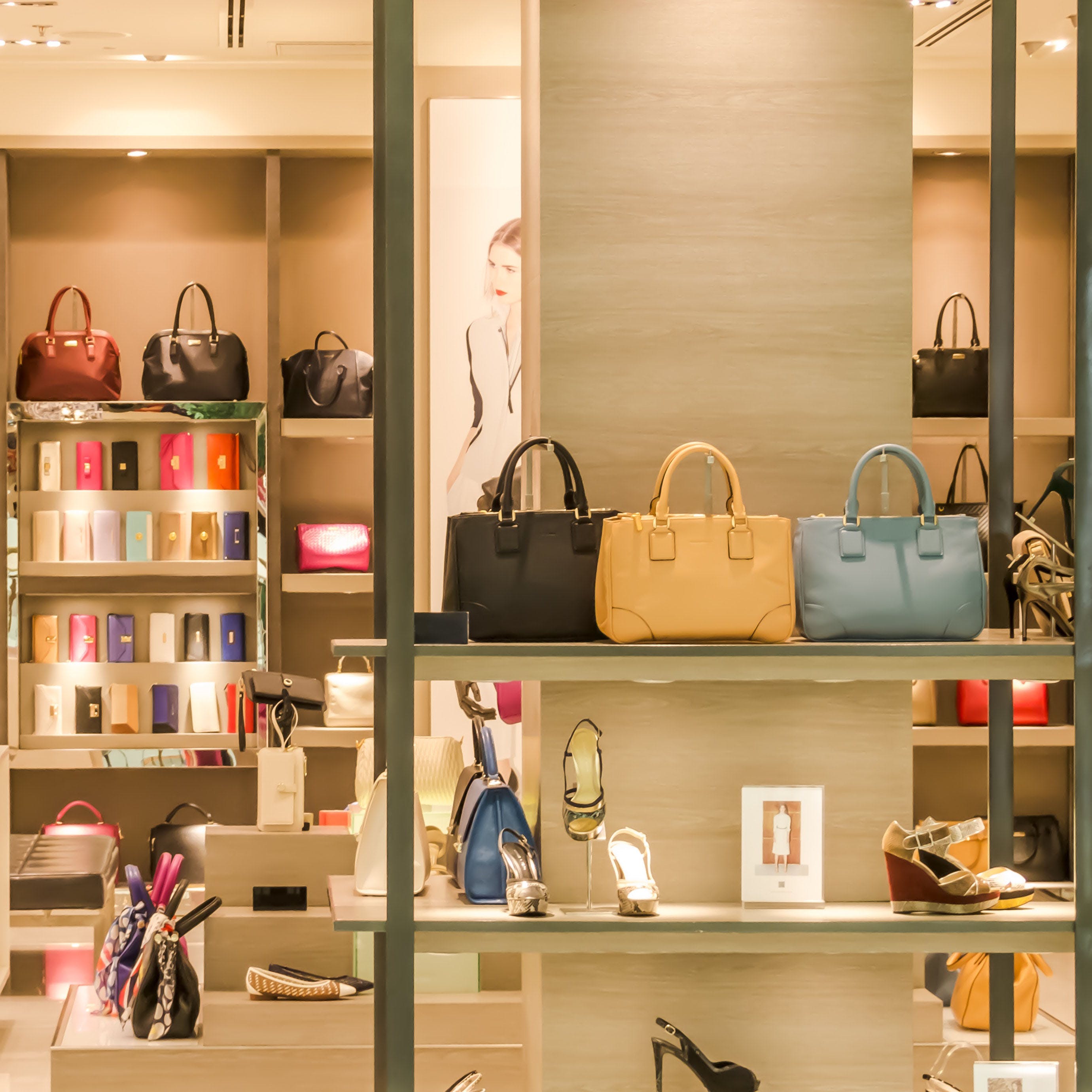 Shelf,Handbag,Building,Retail,Bag,Boutique,Furniture,Shelving,Interior design,Outlet store