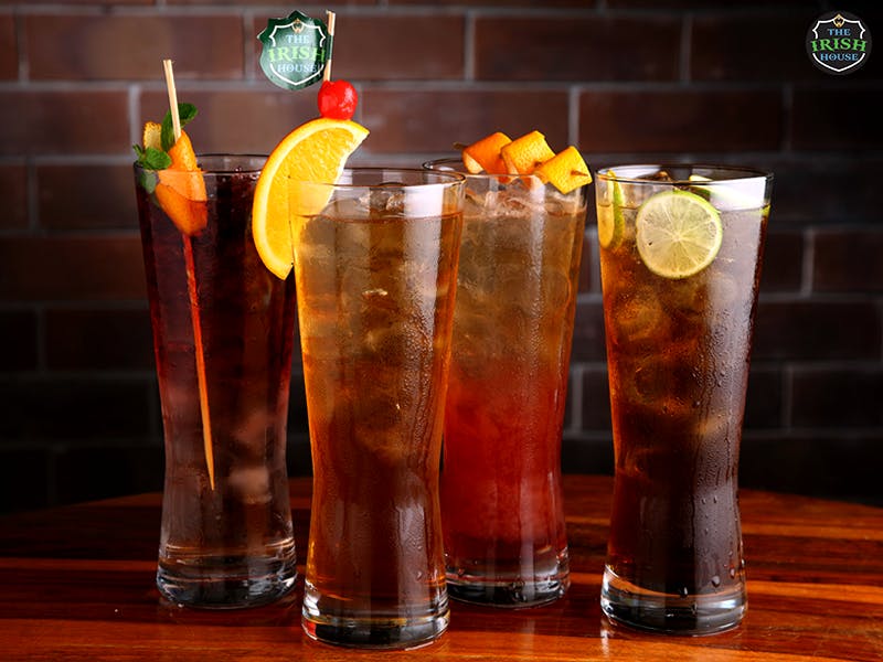 Drink,Alcoholic beverage,Long island iced tea,Cocktail,Distilled beverage,Rum swizzle,Zombie,Non-alcoholic beverage,Cocktail garnish,Dark 'n' stormy