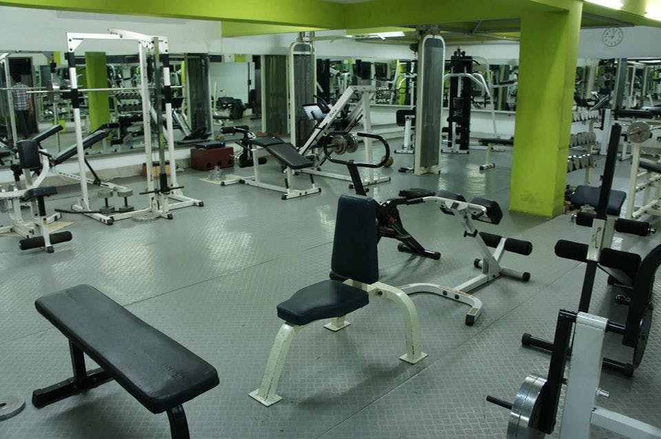 Gym,Physical fitness,Room,Sport venue,Exercise equipment,Weight training,Bench,Leisure centre,Weightlifting machine,Exercise machine