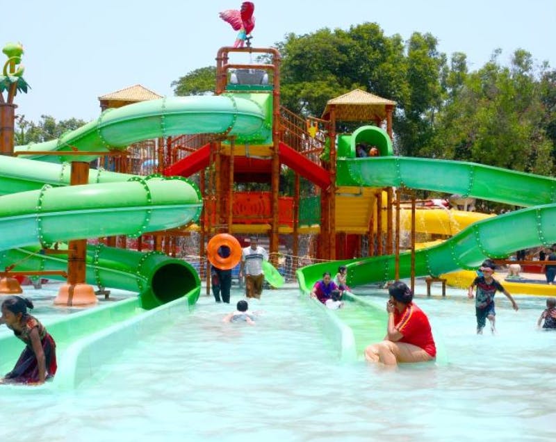 Water park,Amusement park,Leisure,Recreation,Park,Fun,Chute,Swimming pool,Playground slide,Nonbuilding structure