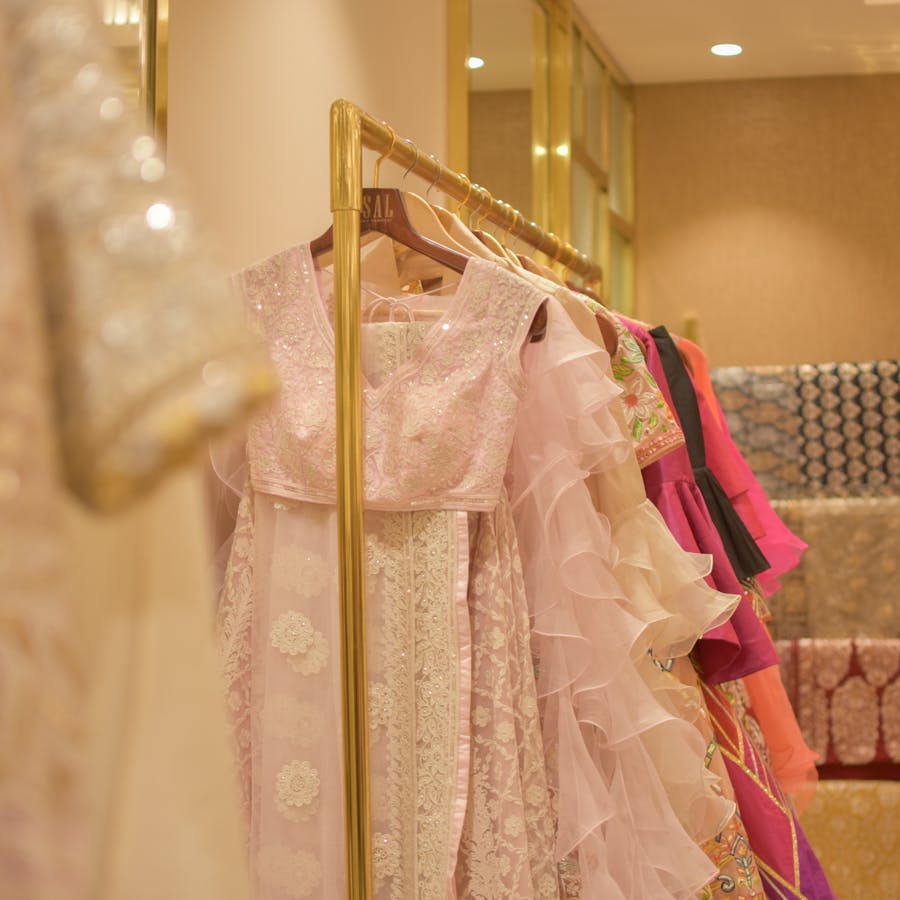 Pink,Clothing,Dress,Room,Silk,Peach,Boutique,Fashion design,Textile,Outerwear