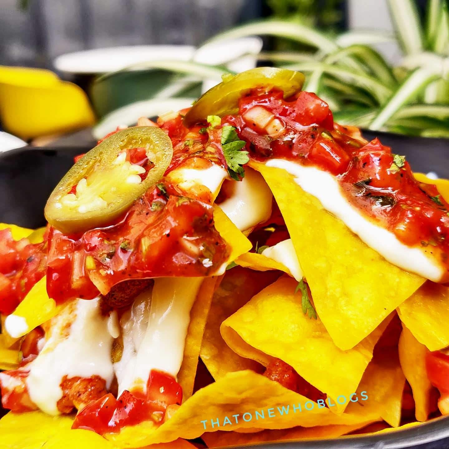 Dish,Food,Cuisine,Ingredient,Nachos,Produce,Junk food,Meat,Tortilla chip,Mexican food