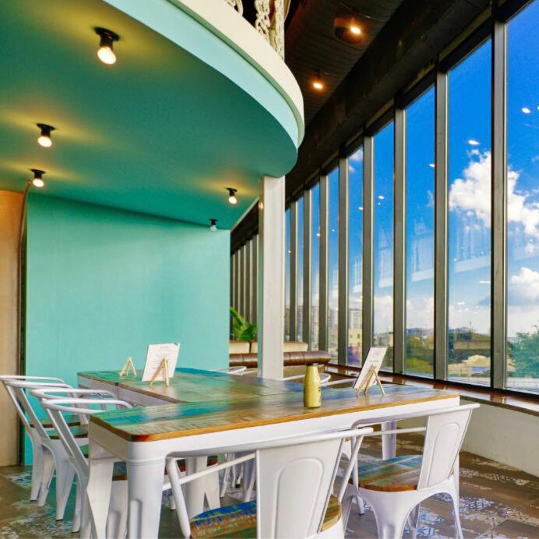 Room,Building,Interior design,Property,Ceiling,Table,Lighting,Furniture,Turquoise,House