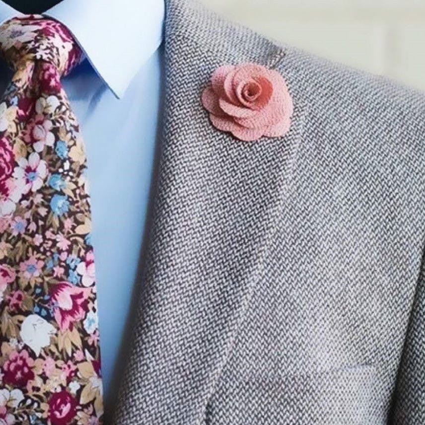 Pink,Clothing,Pattern,Formal wear,Suit,Outerwear,Textile,Dress,Blazer,Design