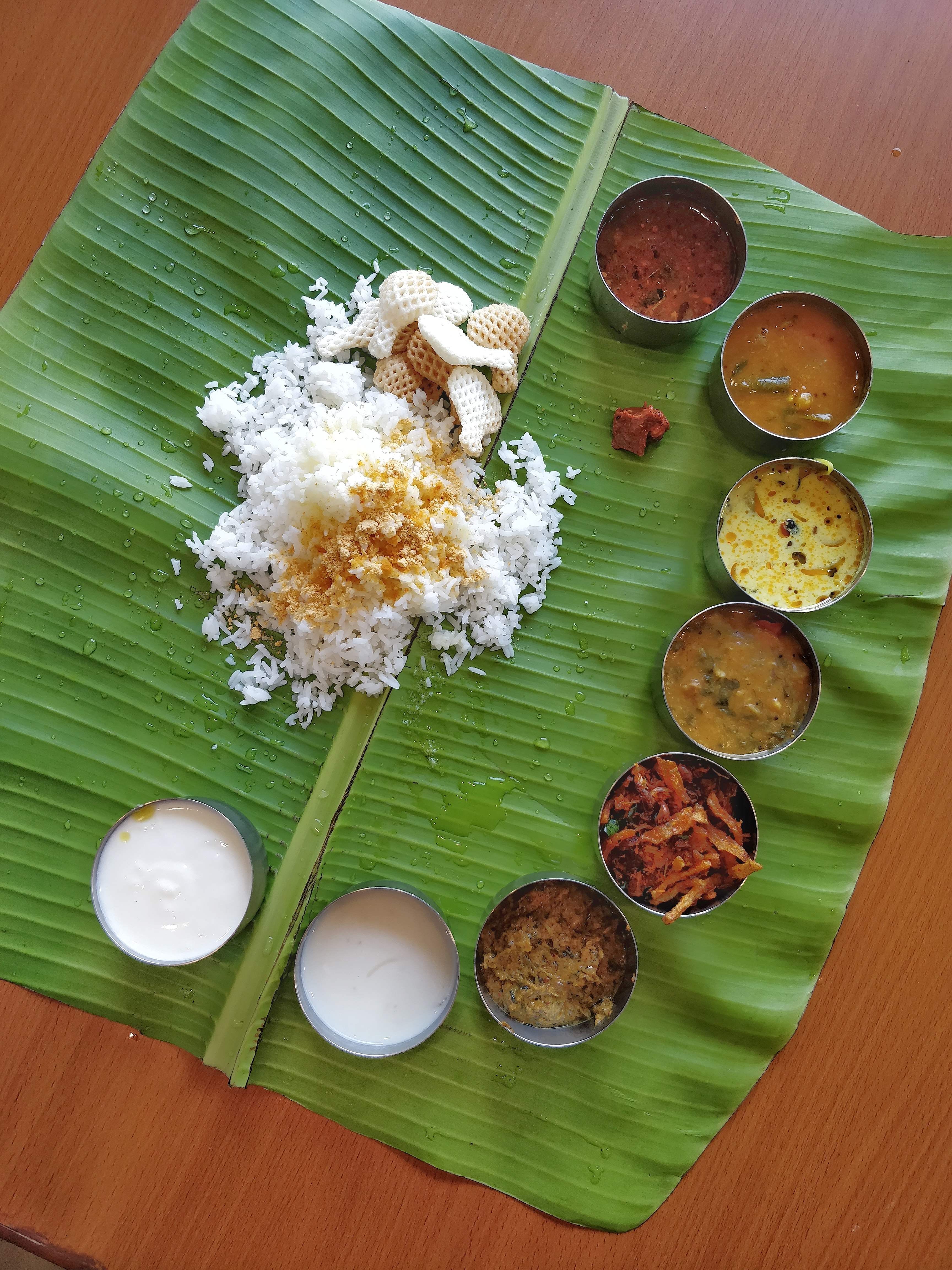 Dish,Food,Cuisine,Sadya,Banana leaf rice,Banana leaf,Leaf,Andhra food,Ingredient,Tamil food