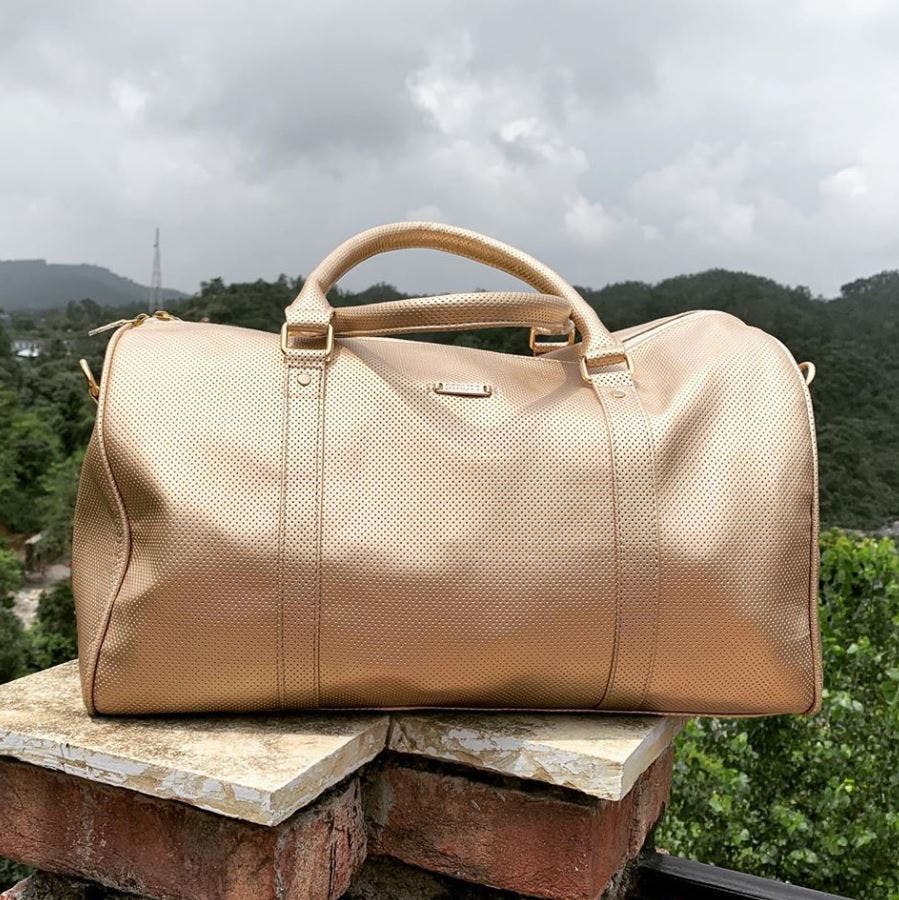Handbag,Bag,Leather,Fashion accessory,Beige,Hand luggage,Beauty,Brown,Fashion,Shoulder bag