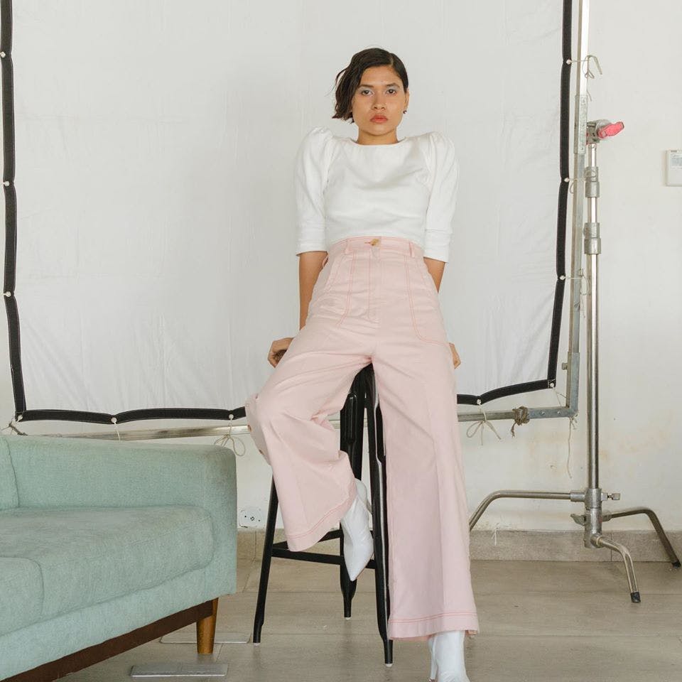 Clothing,White,Shoulder,Leg,Waist,Fashion,Standing,Joint,Neck,Trousers