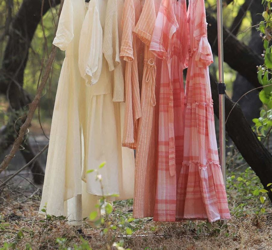 Clothing,Pink,Dress,Peach,Yellow,Outerwear,Fashion,Tree,Textile,Costume