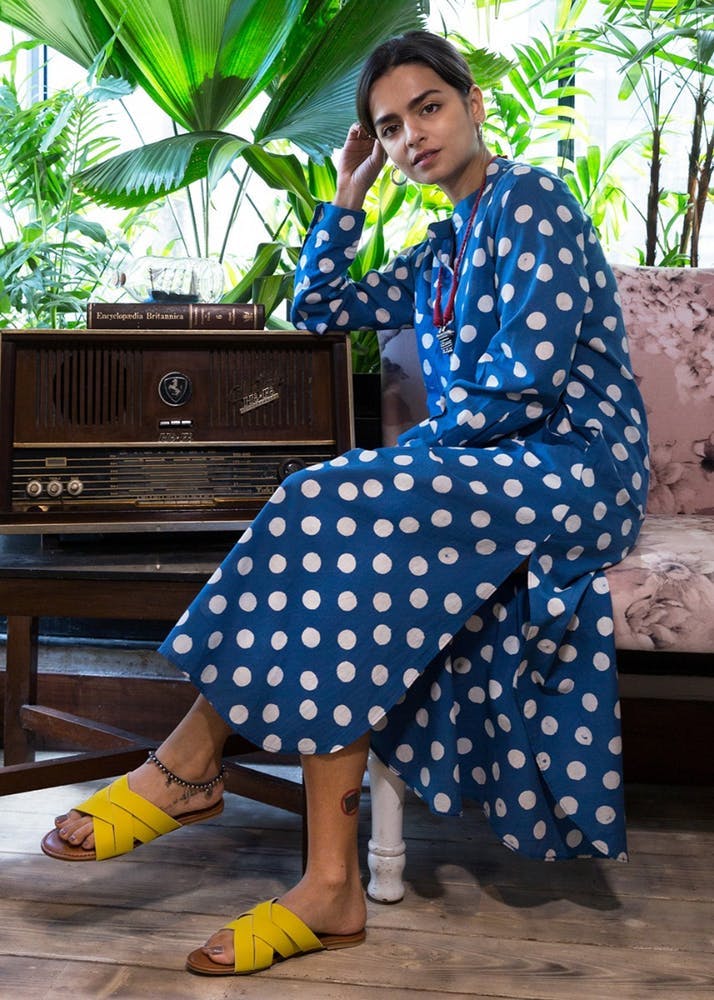 Blue,Polka dot,Yellow,Pattern,Photo shoot,Textile,Leisure