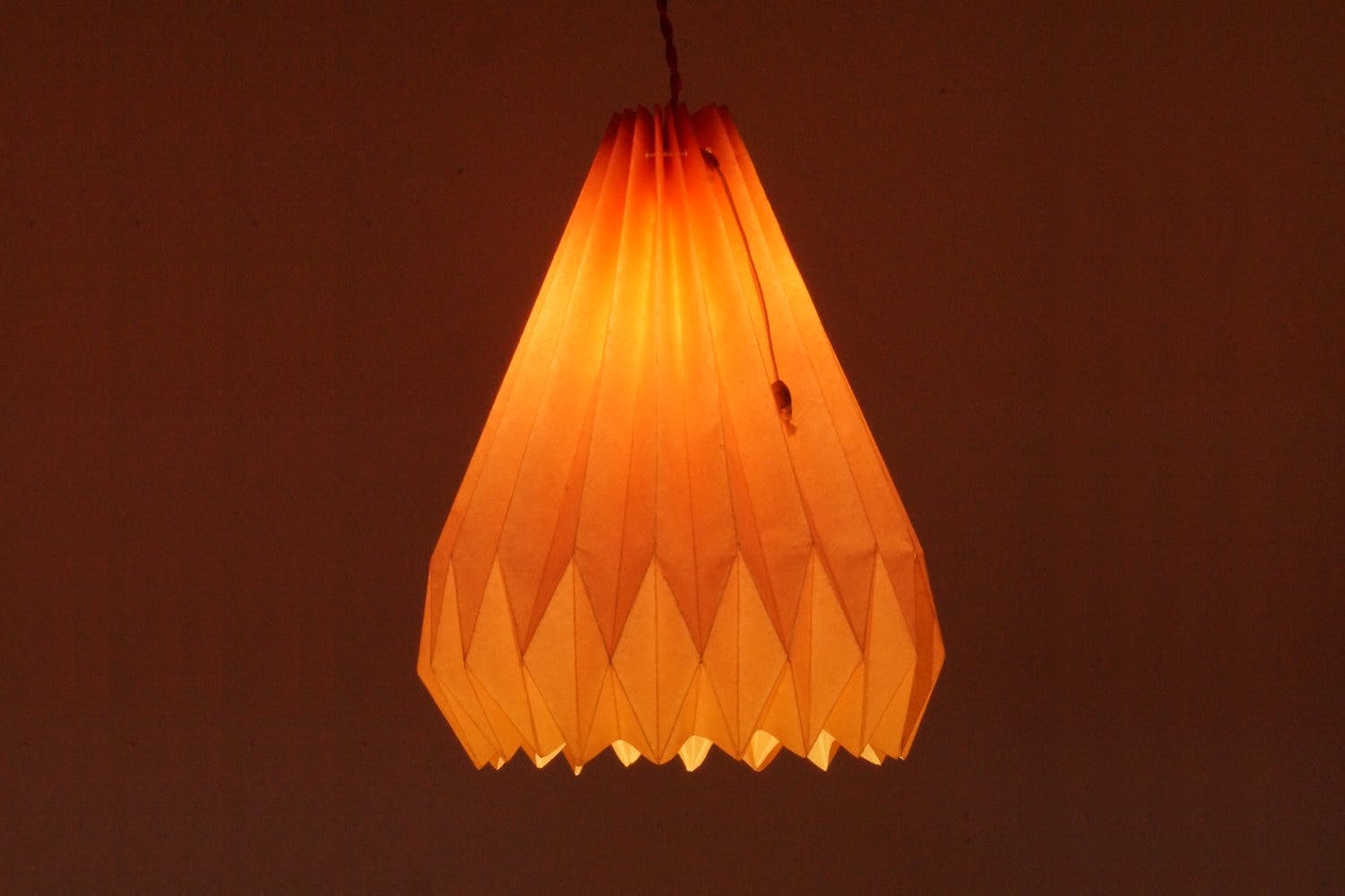 Orange,Lighting,Lighting accessory,Lampshade,Light fixture,Lamp,Ceiling fixture,Interior design,Tints and shades
