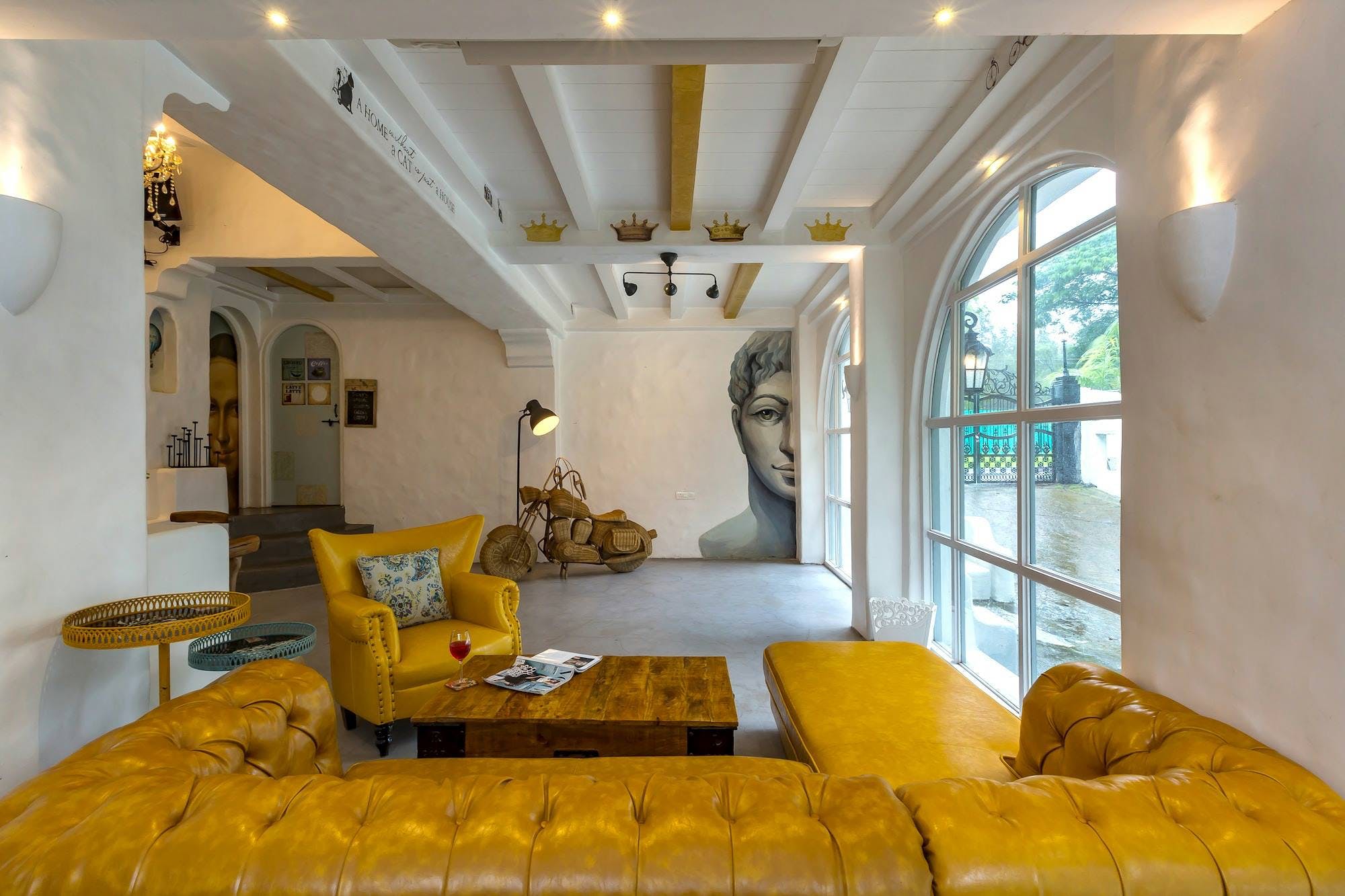 Room,Interior design,Living room,Ceiling,Property,Furniture,Yellow,Building,Home,House