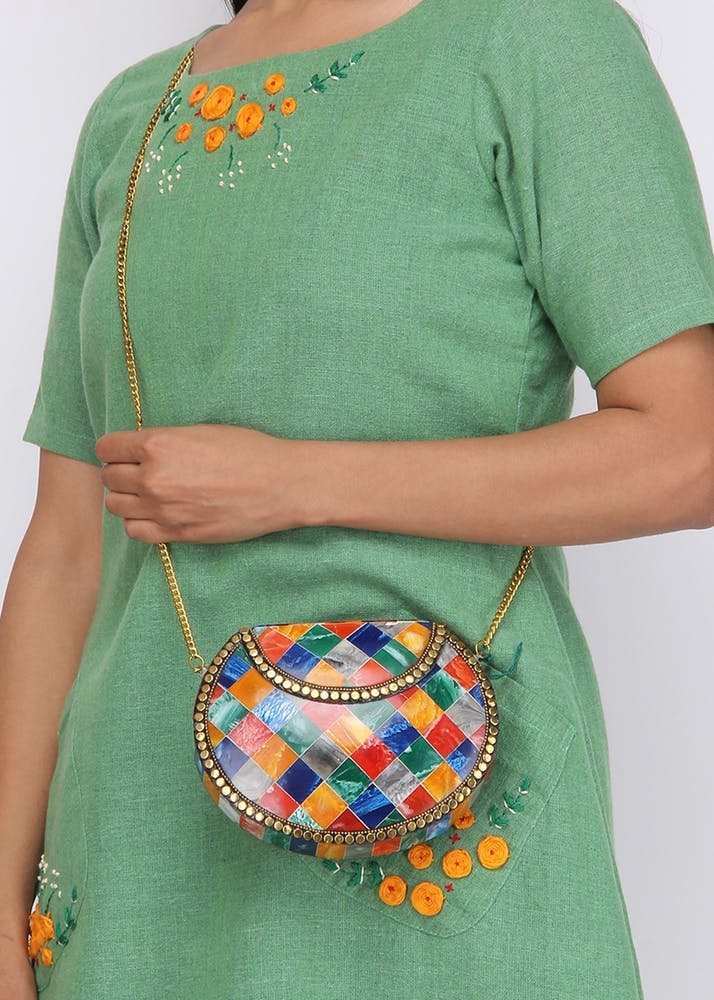Green,Orange,Shoulder,Turquoise,Handbag,Neck,Bag,Joint,Fashion accessory,Design