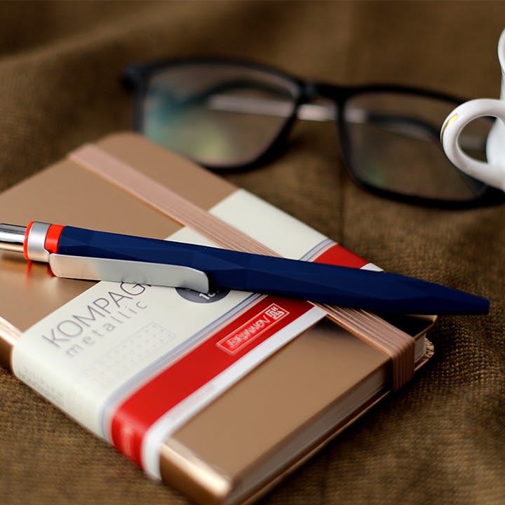 Eyewear,Glasses,Red,Pen,Material property,Vision care,Stationery,Ball pen,Office supplies,Writing implement