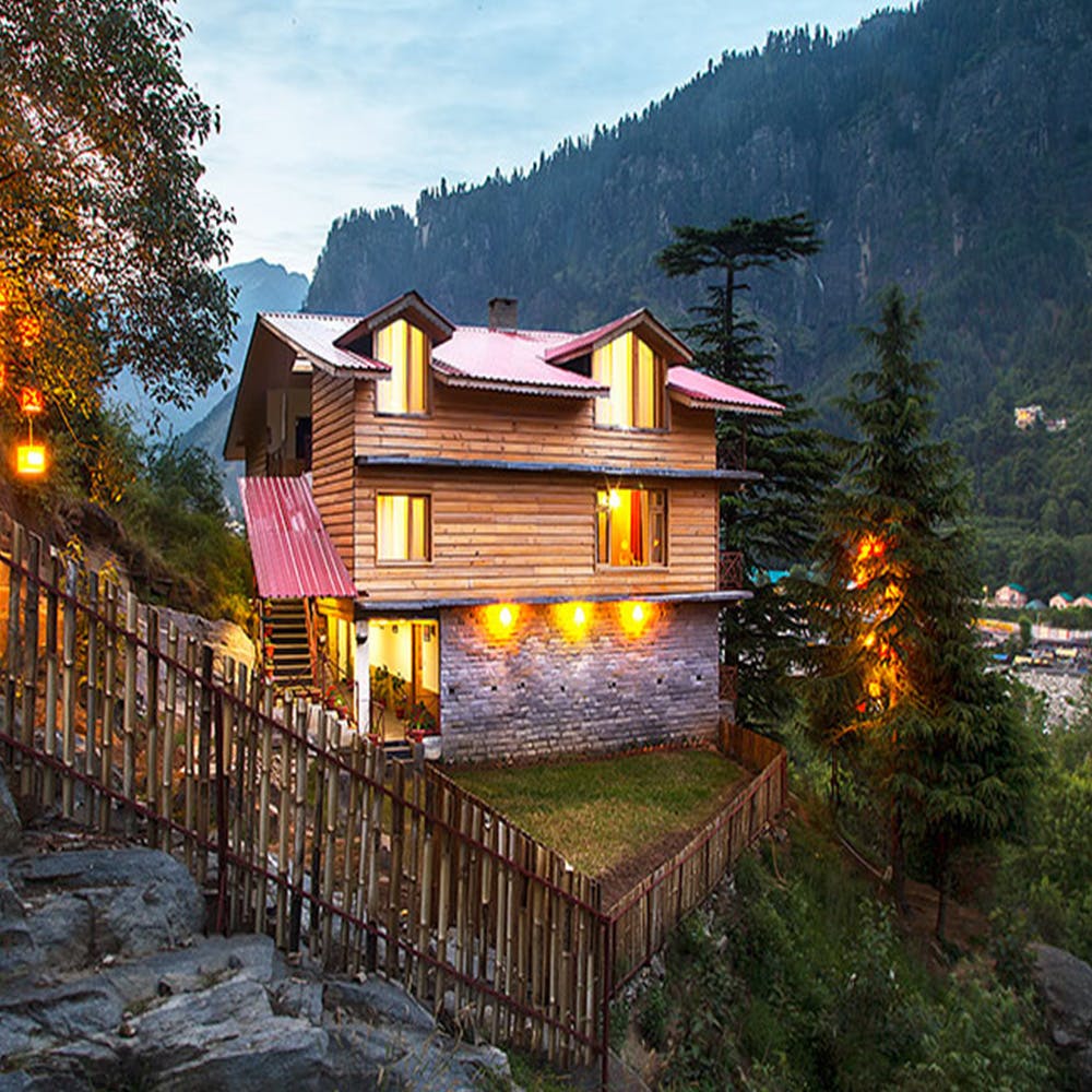 Nature,Home,House,Sky,Property,Natural landscape,Tree,Architecture,Lighting,Log cabin
