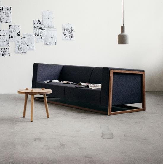 Furniture,Black,Table,Interior design,Room,Wall,Coffee table,Floor,Design,Living room