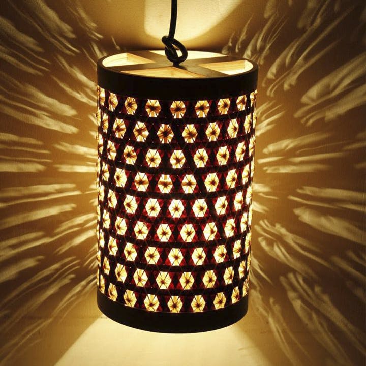 Lighting,Beverage can,Light,Lampshade,Yellow,Lighting accessory,Cylinder,Light fixture,Lamp,Home accessories