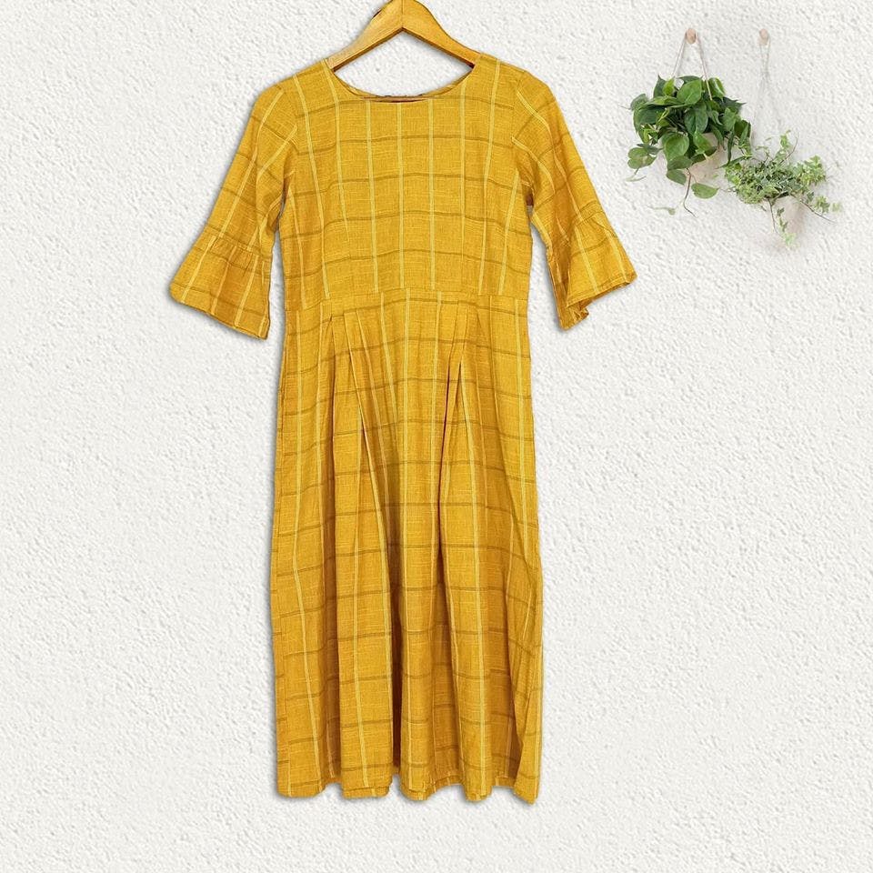 Clothing,Yellow,Sleeve,Product,Pattern,Outerwear,Font,Day dress,Dress,Clothes hanger