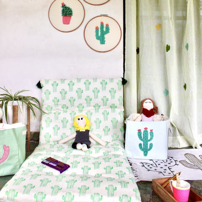 Green,Room,Interior design,Design,Textile,Pattern,Furniture,Table,Bed sheet,Owl