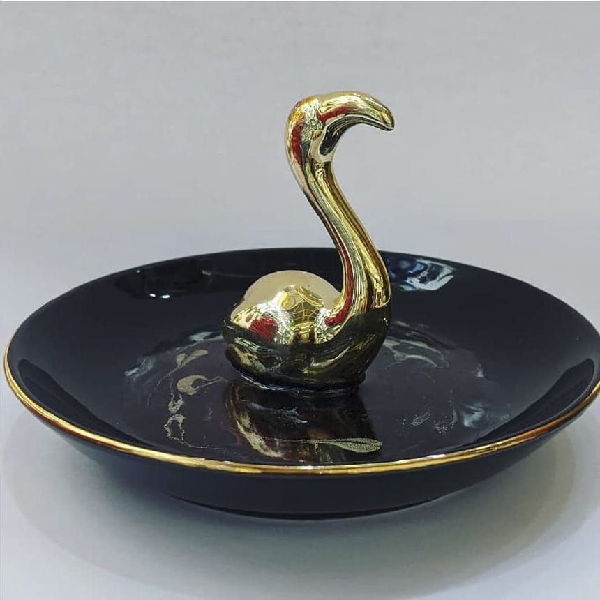 Bird,Bubbler,Water feature,Swan,Water bird,Metal