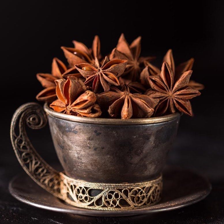 Star anise,Cinnamon,Anise,Spice,Still life photography,Cinnamon stick,Leaf,Plant,Herb,Still life