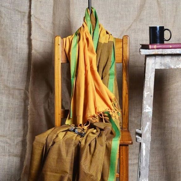 Clothes hanger,Green,Yellow,Textile,Room,Linens,Furniture,Silk,Leather,Wardrobe