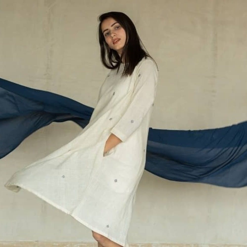 White,Clothing,Outerwear,Neck,Dress,Leg,Sleeve,Textile,Photography,Formal wear