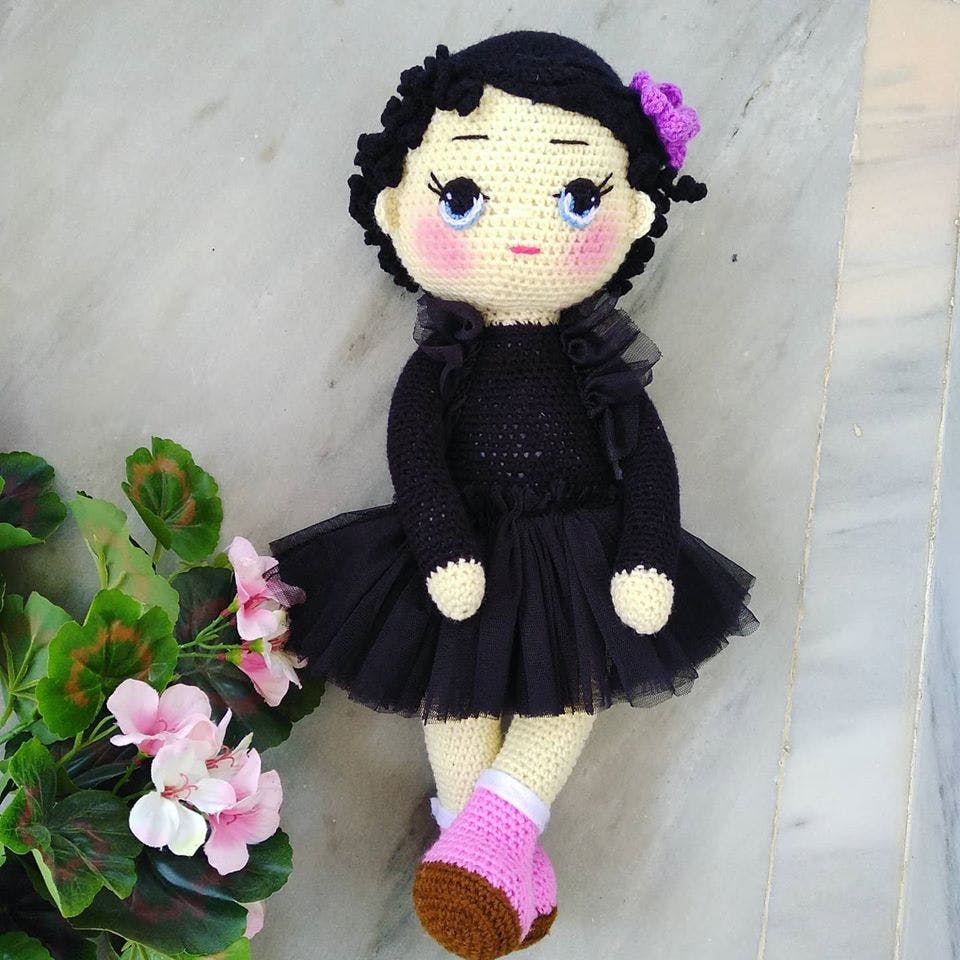 Doll,Pink,Toy,Crochet,Dress,Black hair,Flower,Plant