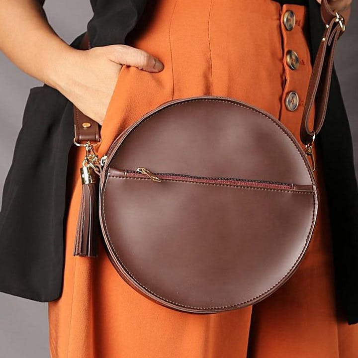 Bag,Leather,Orange,Brown,Handbag,Tan,Waist,Shoulder,Fashion accessory,Material property