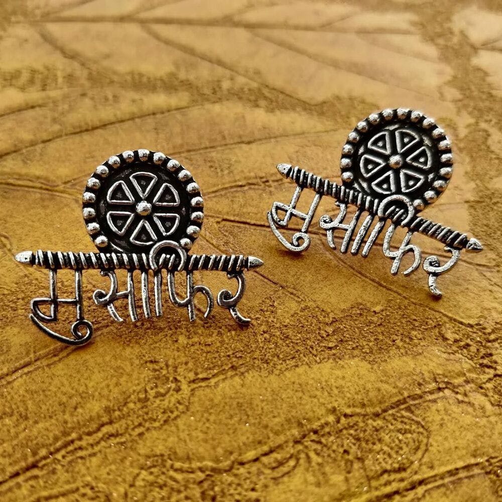 Font,Text,Logo,Jewellery,Calligraphy,Metal,Pattern,Earrings,Graphics,Fashion accessory
