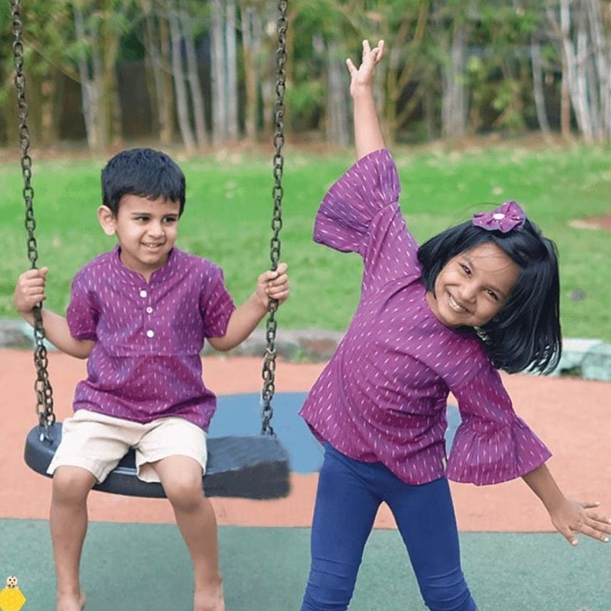 Swing,Outdoor play equipment,Fun,Child,Playground,Public space,Play,Smile,Happy,Recreation